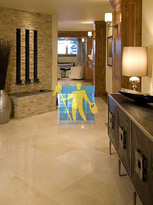 Geelong home with shiny limestone tile floor