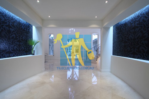 Sunshine Coast contemporary entry with crema marfil marble tiles on floors