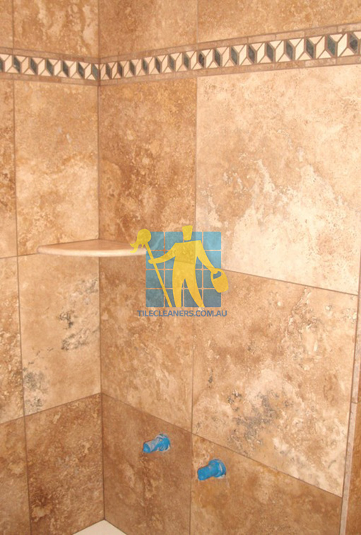 traditional bathroom with stone tiles on walls sealed with penetrating sealer Cairns