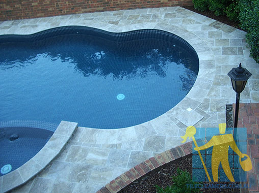 cleaned outdoor pool travertine_tiles 