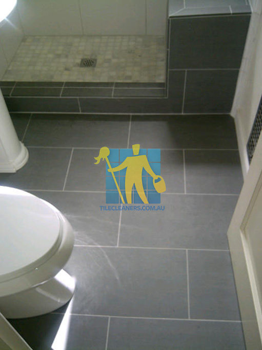 traditional bathroom floor with master bathroom with porcelain grey floor rectangular with white grout lines Campbelltown