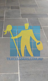 Melbourne/Yarra bluestone tiles contemporary irregular shape white grout indoor unfurnished