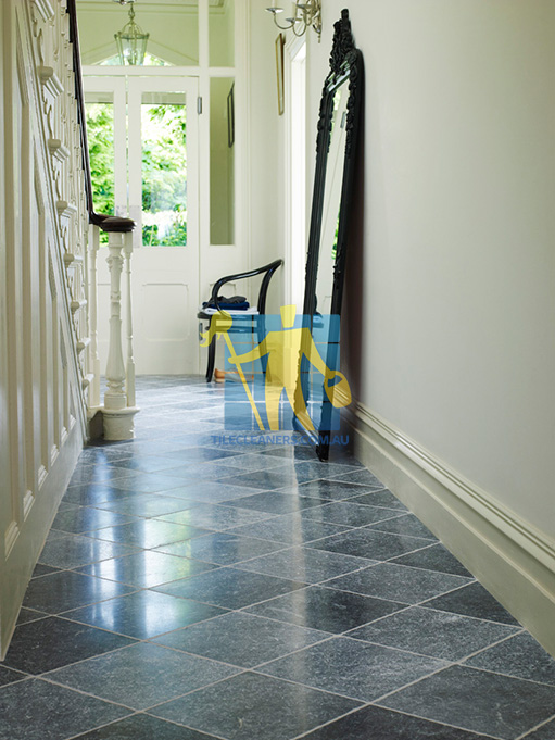 Playford bluestone tumbled tile indoor hallway white grout