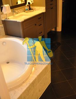 traditional bathroom with black granite tiles on the floor Sydney Olympic Park/Southern Sydney