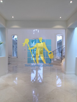 contemporary entry with crema marfil marble tiles on floors Gold Coast/Varsity Lakes