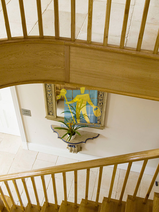 Craigieburn marble tile tumbled acru hallway under wooden staircase