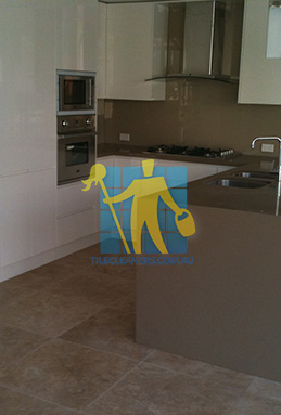 kitchen with clean porcelain floor tiles after cleaning by tile cleaners Brisbane Moreton Bay Region Deception Bay