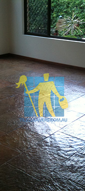 empty room with shiny slate tiles in empty room after sealing slate floors Melbourne/Frankston