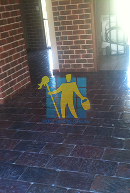 large area of slate tiles after sealing with glossy sealer empty room regular pattern Melbourne/Port Phillip