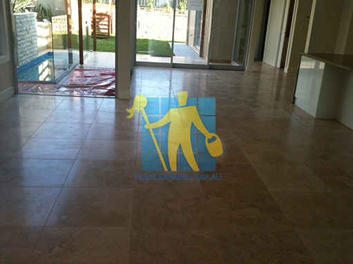 empty room of travertine tiles in large empty living room large tiles after cleaning Cairns