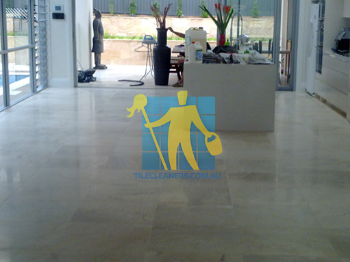 travertine tiles in large empty living room large tiles after cleaning by tile cleaners Lanefield