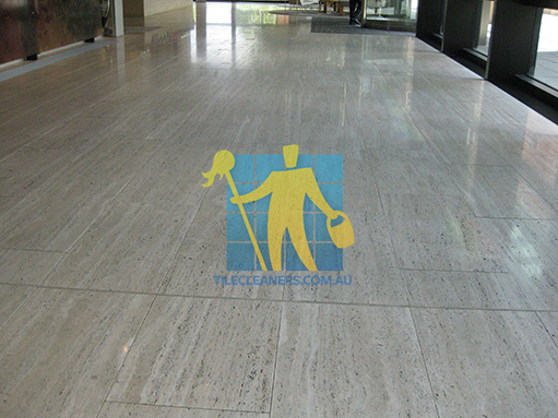 travertine tiles rectangles regular size large tiles shiny after cleaning by tiles cleaners technician Canberra
